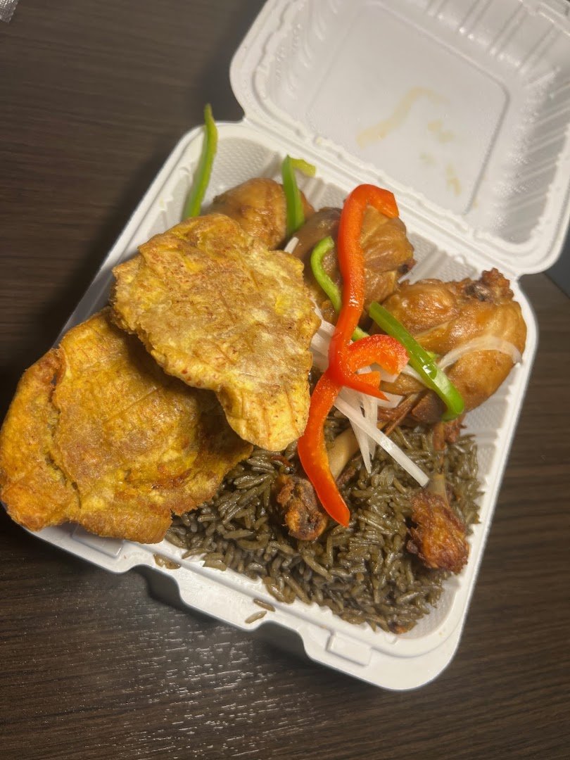 Colorful Caribbean plates with rice and plantains.